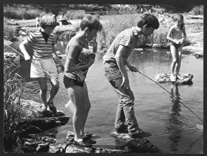 Children Fish in Stream