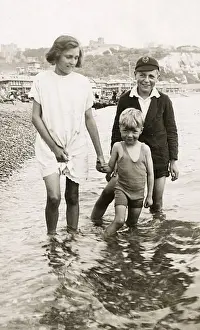 Shingle Prints: Three children having a paddle - Dover, Kent