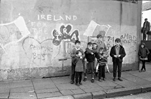 Images Dated 11th September 2015: Children with IRA graffiti, Belfast, Northern Ireland
