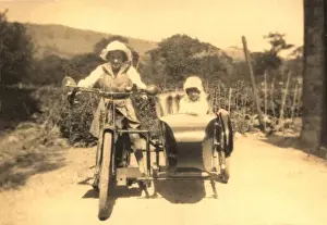 Children in motorcycle and side car
