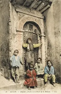 Kerb Prints: Children by an ornate doorway