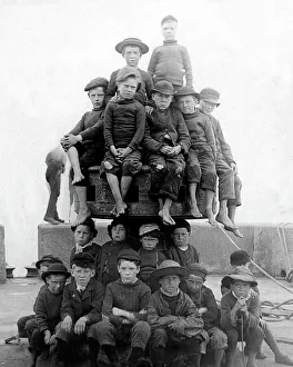 Capstan Prints: Children palying on quayside capstan