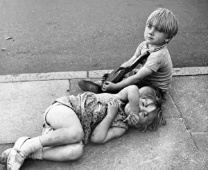 Scruffy Prints: Two children on pavement, Balham, SW London