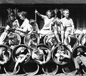 Urchins Prints: Children with pipes on a Balham street, SW London