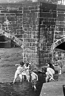 Images Dated 2nd July 2019: Children play in the water of Hebden Beck