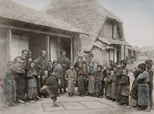 Children playing hopscotch street game, Japan