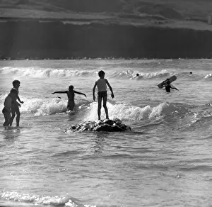 Children playing in the sea