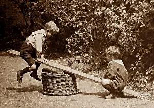 Seesaw Prints: Children playing on a seesaw