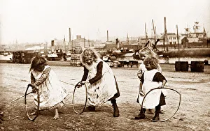 Hoops Prints: Children playing with stick and hoops