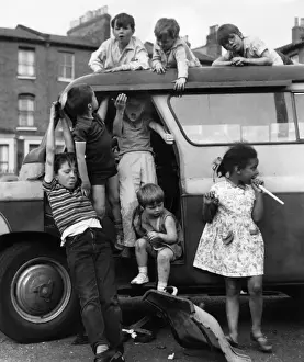 Terrace Prints: Children playing with a van in a Balham street, SW London