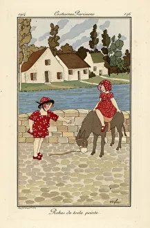 Ciel Prints: Two children in printed toile summer outfits with a donkey