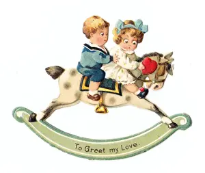 Two children on a rocking horse on a movable Valentine card