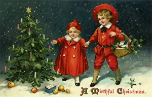 Children round a Christmas tree