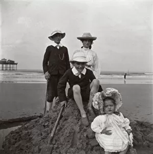 Images Dated 13th February 2017: Four children on a sandcastle, Saltburn, North Yorkshire