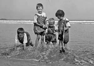 Four children on a seaside holiday