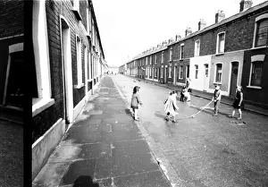 Children skipping in a street, Belfast, Northern Ireland