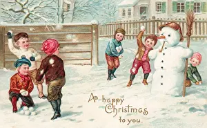 Snowman Prints: Children snowballing on a Christmas postcard