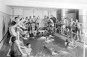 Plunge Prints: Children swimming in the News Tribune newspaper pool