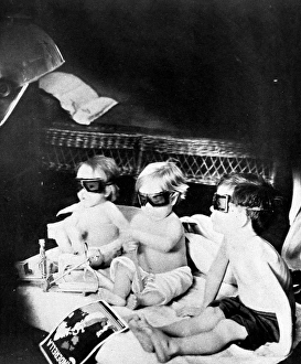 Children being treated with ultra-violet light Children being treated with ultra-violet light