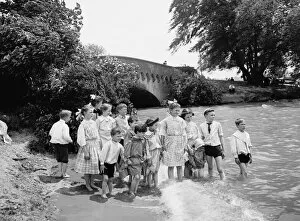 Children wading in the water at Belle Isle Park in Detroit