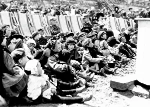 Children watching a Punch and Judy show
