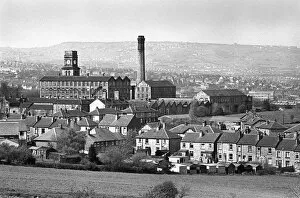 Images Dated 27th August 2019: Mill chimney and terraced houses in Huddersfield, Yorkshire