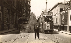 China - Shanghai - Street scene with tram and Policeman