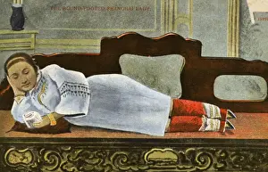 Reclines Prints: China - Shanghai - Woman with bound feet reclining on divan