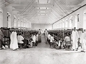 China - workers in a factory processing tea or silk