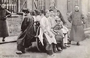Eight Chinese Factory Girls on a wheelbarrow, China