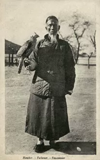 Chinese falconer with a Goshawk
