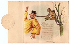 Plait Gallery: Chinese man and monkey on a Christmas card