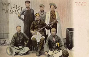 Imported Gallery: Chinese Musicians - one playing an Erhu - South Africa