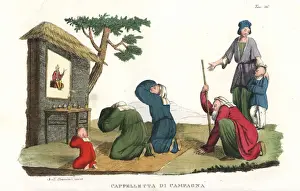 Chinese peasants worshipping at a temple in the country