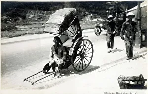 Rickshaw Collection: Chinese Rickshaw Boy taking a rest - Hong Kong