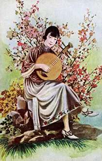 Lute Gallery: Chinese woman playing a Ruan