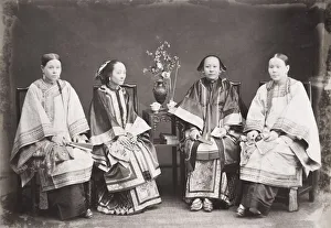 Chinese women in ornate robes with bound feet, China