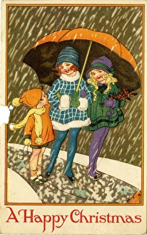 Images Dated 4th August 2016: Christmas Card - children under umbrella in snow
