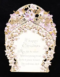 Christmas card with cutout mauve daisies