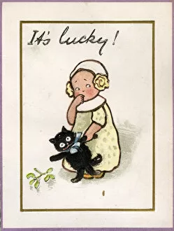 Images Dated 6th February 2017: Christmas card, girl with black cat and mistletoe