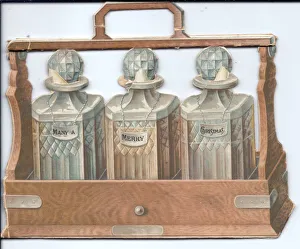Images Dated 16th May 2018: Christmas card in the shape of three decanters