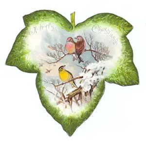 Christmas card in the shape of a green leaf with birds