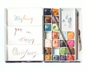 Christmas card in the shape of an open paintbox