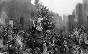 Christmas day at the Hackney street shrines, London, 1916