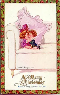 Spurgin Prints: Christmas postcard, Little girl and boy kissing on a sofa - Keep a cosy corner for me! Date: early 20th century
