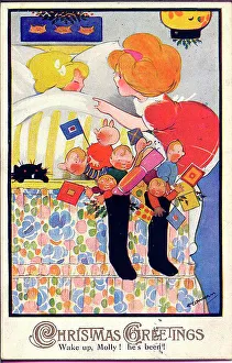 Hilda Prints: Christmas postcard, two little girls - Wake up, Molly! he's been! Date: circa 1930s