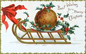 Festive Gallery: Christmas Pudding being pulled along atop a wooden sled