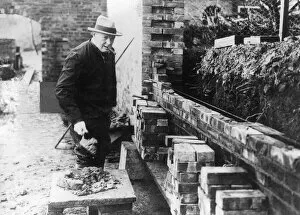 Churchill Collection: Churchill bricklaying
