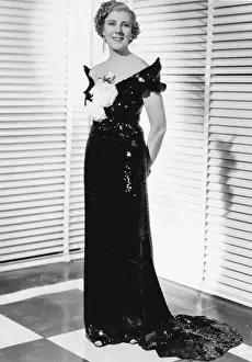 Cicely Courtneidge in one of her Dolly Tree gowns