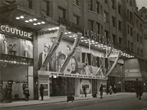 A cinema on the Champs Elysees, Paris, France, where the film La Piste du Sud is showing. Date: 1938